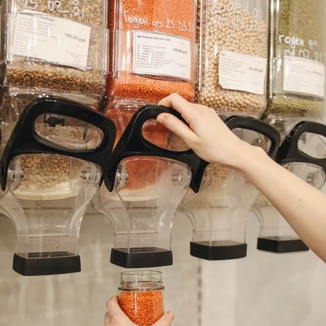 Bulk system at the shop, photo by Polina Tankilevich on Pexels.
