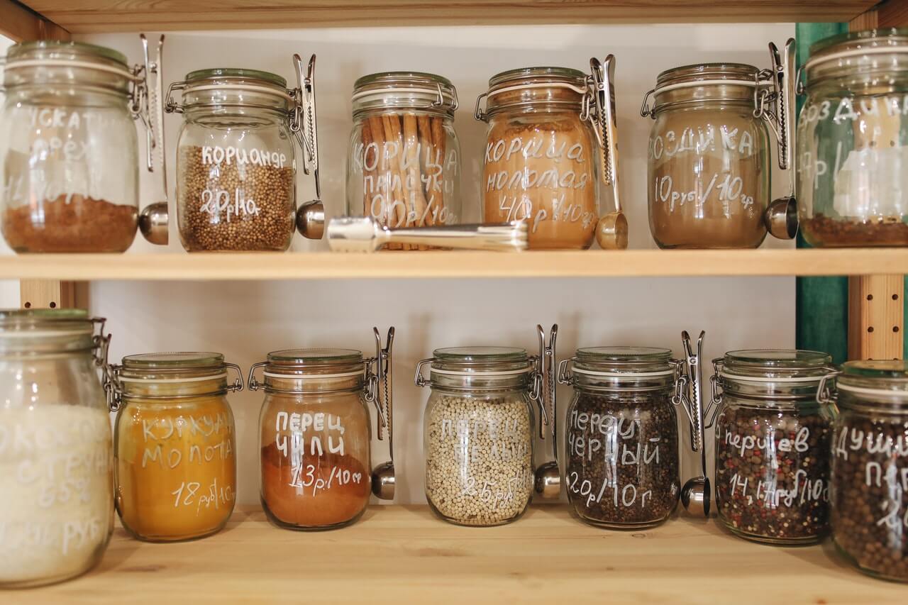 Spices in jars at the shop, photo by Polina Tankilevich on Pexels.